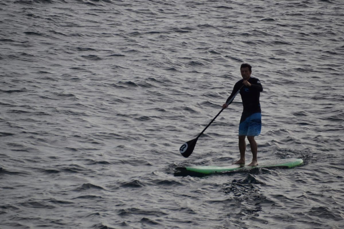 stand up paddle boarding on a lake